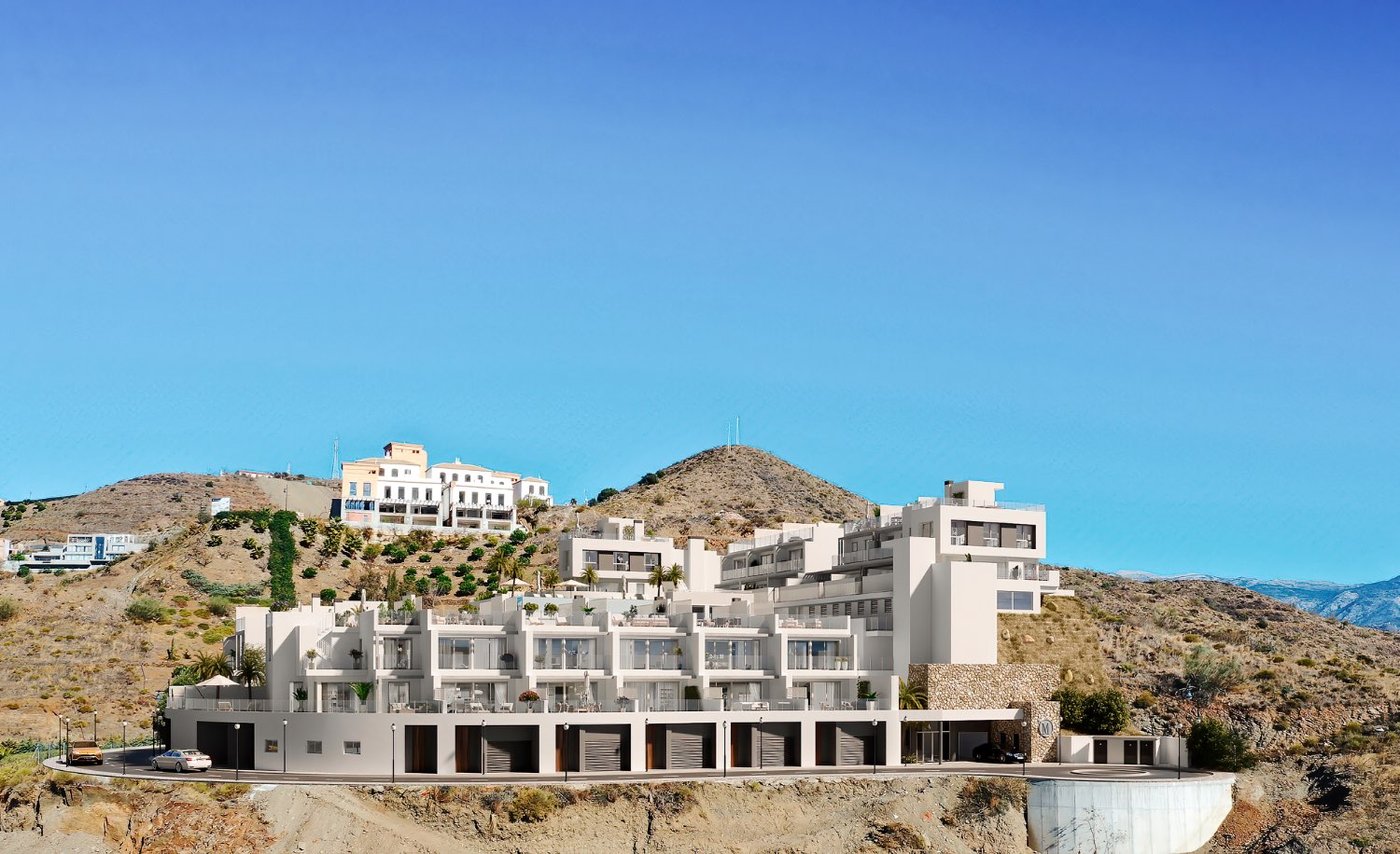22 new built houses with panoramic sea views, 350 meters from El Peñoncillo Playa. Prices from €479,000.